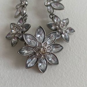Long flower lined necklace silver metal color